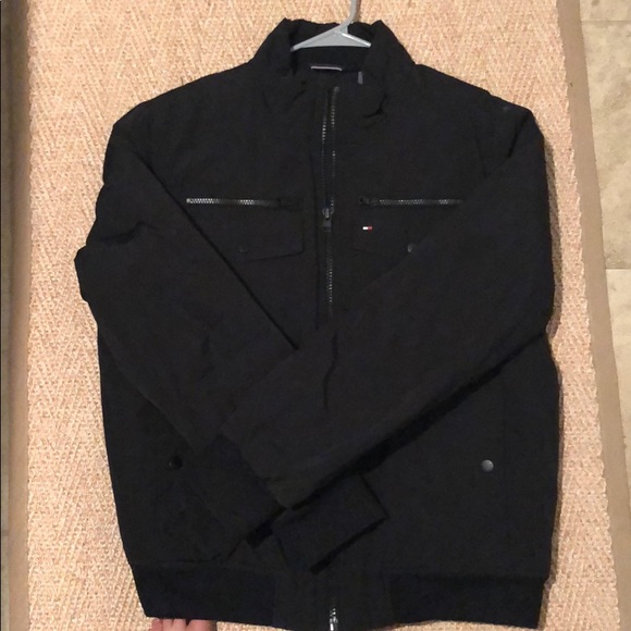 Tommy Hilfiger puffy coat with multiple pockets. - Picture 1 of 5